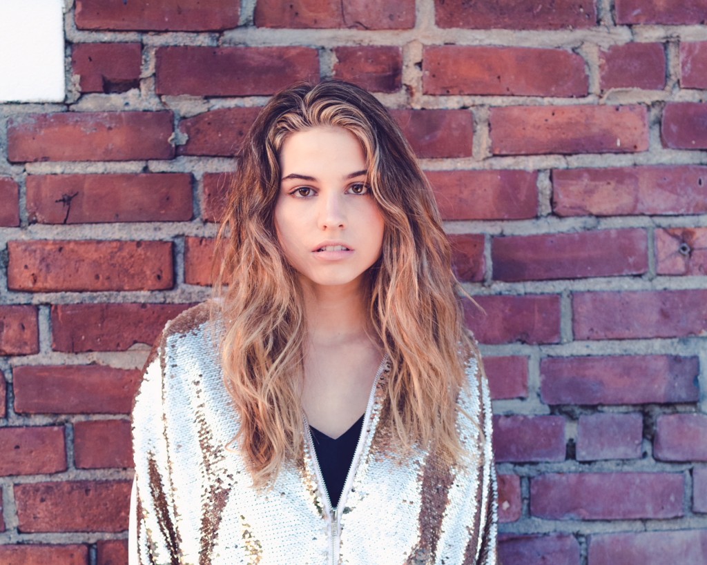 Isabelle Boughner in gold sequin jacket