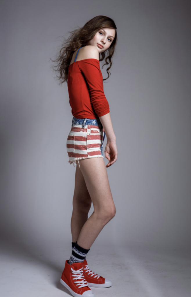 Sammie Lenzi full length - red sweater, stars and stripes shorts
