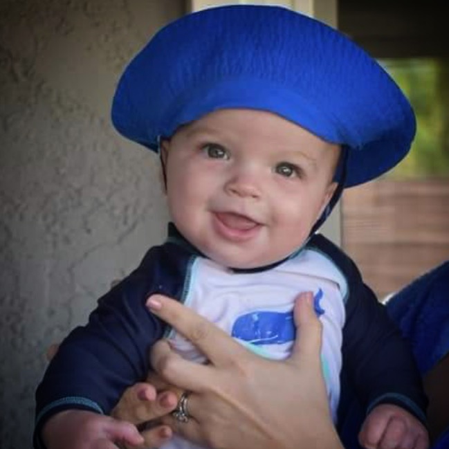 baby model in hat