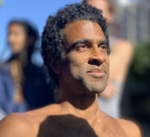 Nigerian man bathed in light